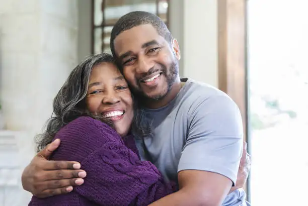 Photo of a couple hugging each other. Photo of a couple hugging each other.