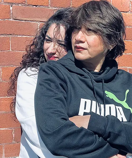 Photo of two ladies as a couple together. Photo of two ladies as a couple together.